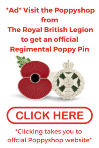 green jacket poppy pin